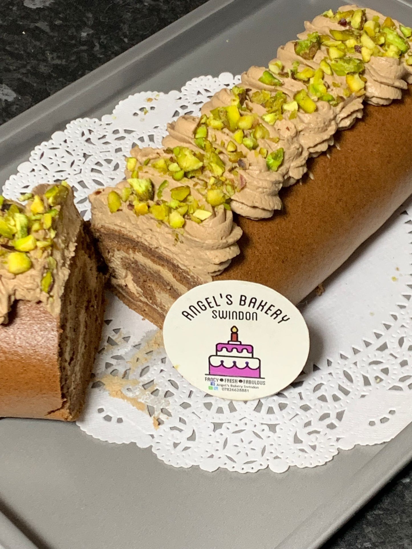 Chocolate Swiss Roll with Pistachio on top