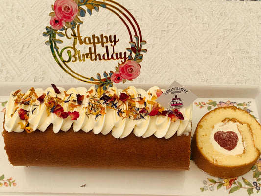 Swiss Roll with heart shape strawberries puree