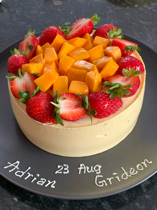 6" Mango Lava Cheese Cake with strawberries and mango on top